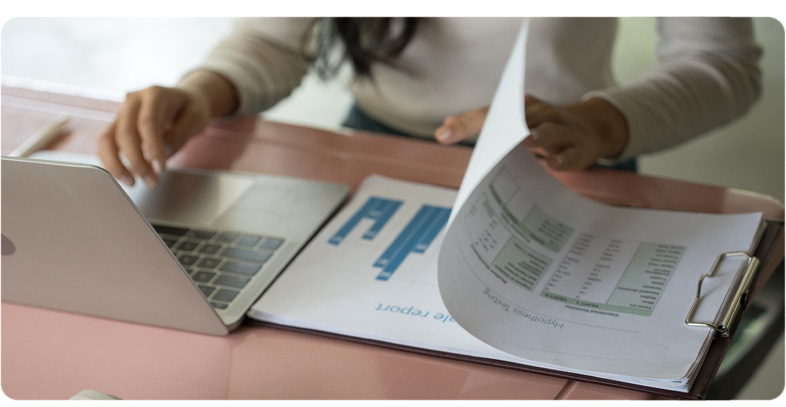 A bookkeeper reviewing a company's financial records for accuracy